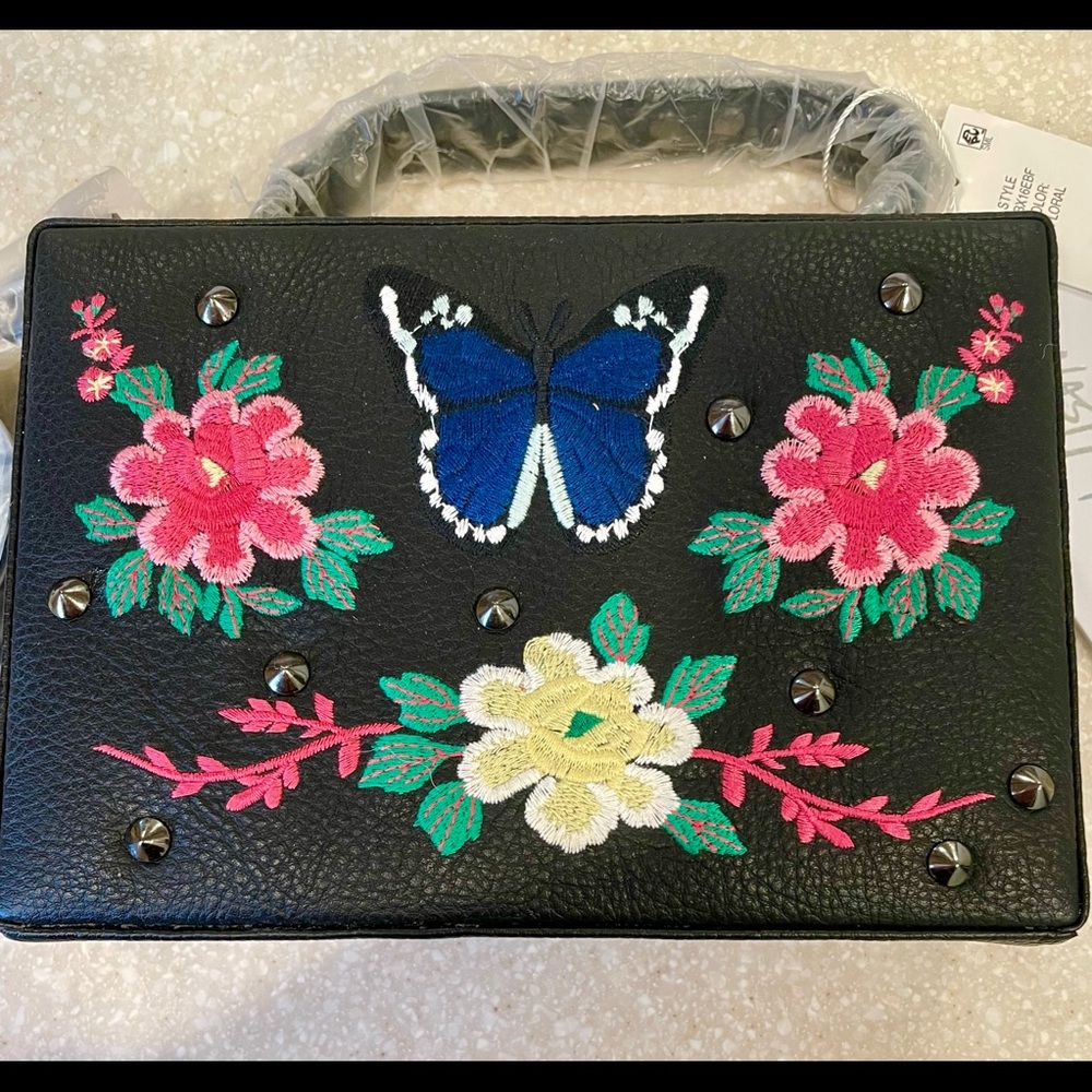 Nasty Gal butterfly and flower embroidered black crossbody.